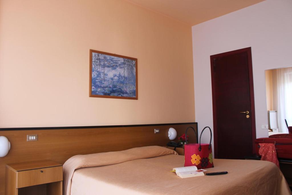 Aries Hotel Lesa Kamer foto